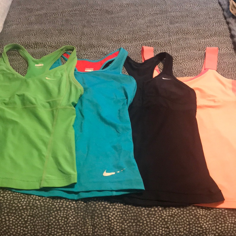 Set of 4 work out tanks (Nike and Xersion)